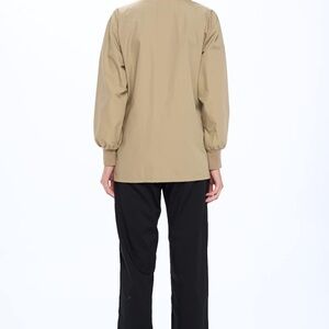 Tan Jacket with Black Pants